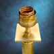 Large vintage brass lamp base in neoclassical column style with a copper socket.