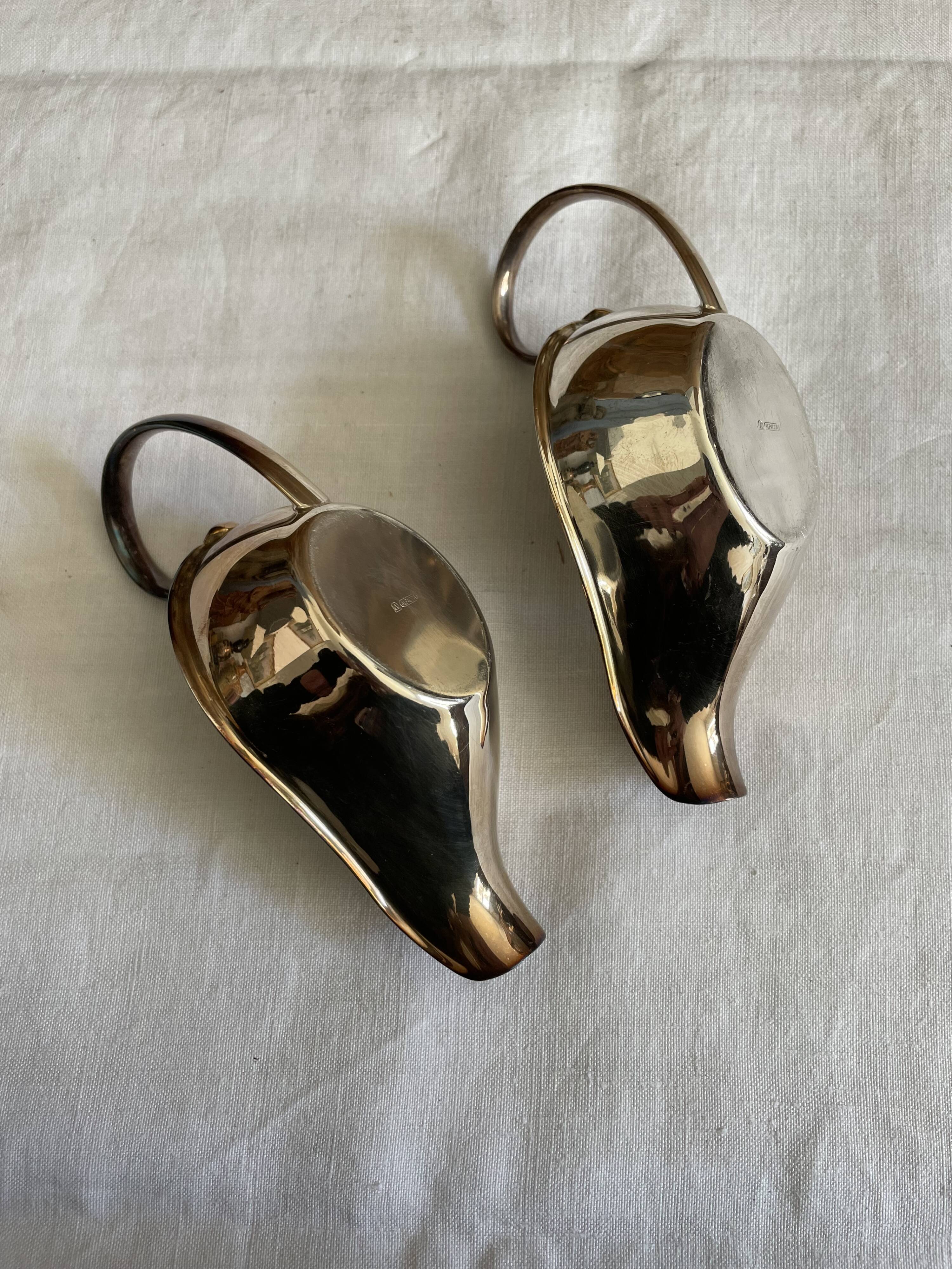 Set of two silver metal saucepans