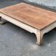 Decapitated opium coffee table in raw wood from the 90s.