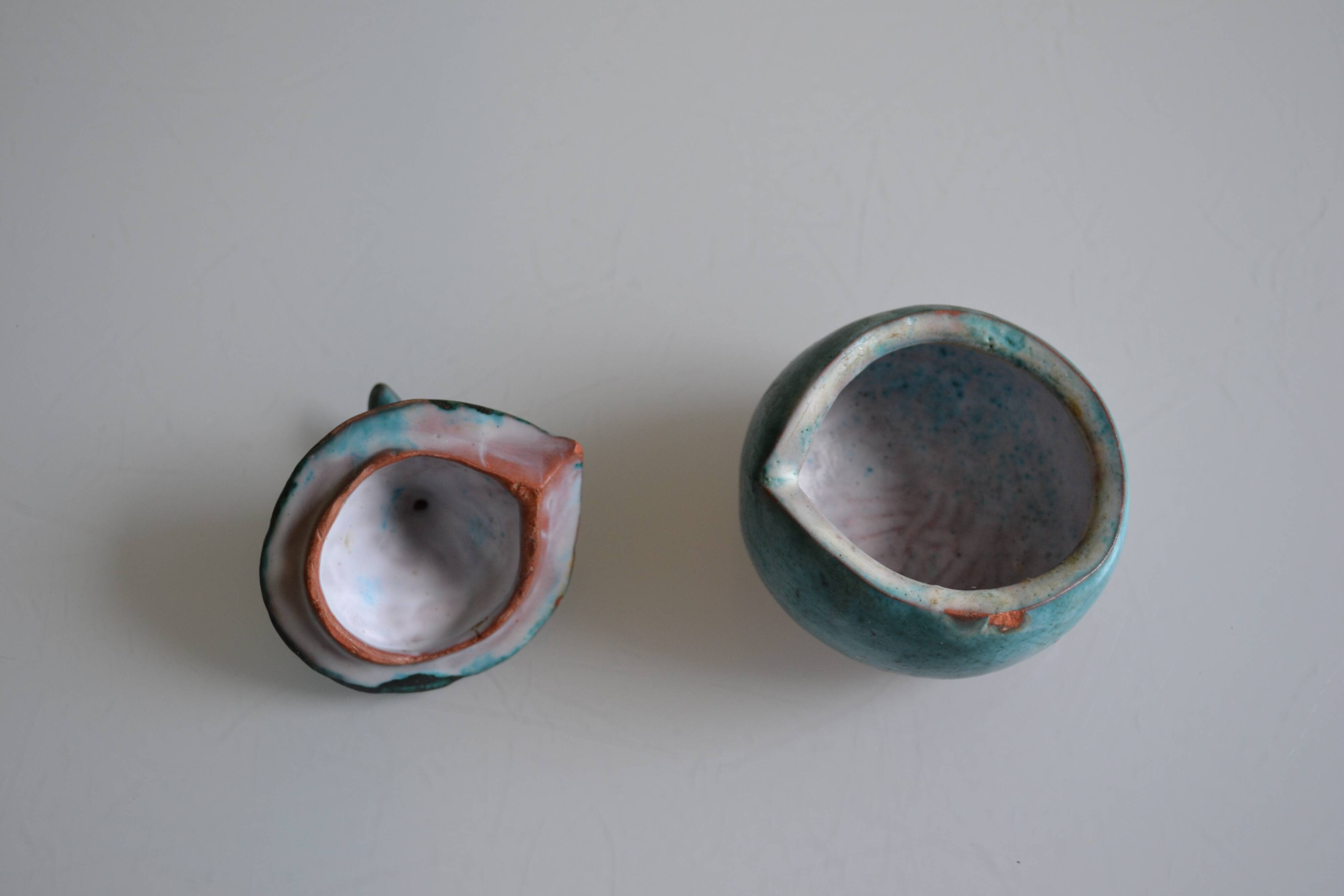 Signature ceramic fish-covered pot to identify.