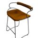 Contemporary bar stool with a smoked black steel backrest and natural tobacco leather.