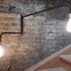 Swivel wall sconce
