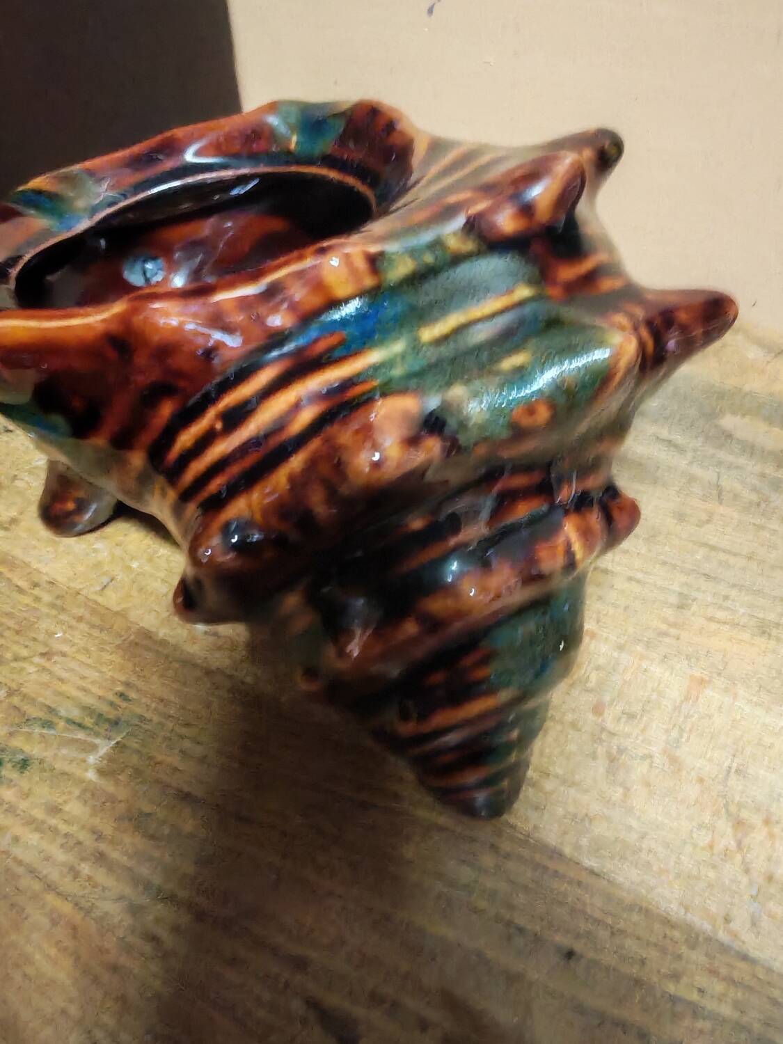 The shell-shaped trinket dish in Vallauris style.