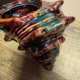 The shell-shaped trinket dish in Vallauris style.