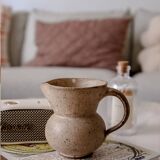 Small pitcher in old speckled stoneware