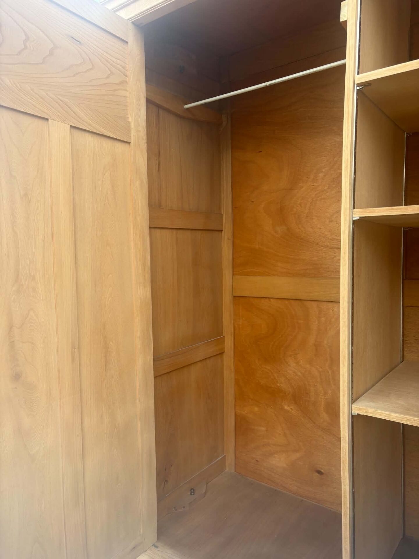 Large antique wardrobe in raw wood