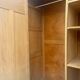 Large antique wardrobe in raw wood