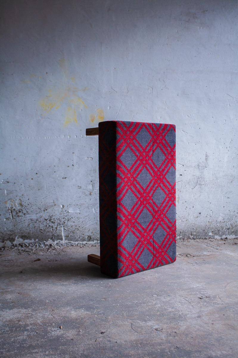 Large red and grey wool tartan upholstered bench with wooden frame