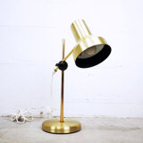 Articulated golden metal table lamp