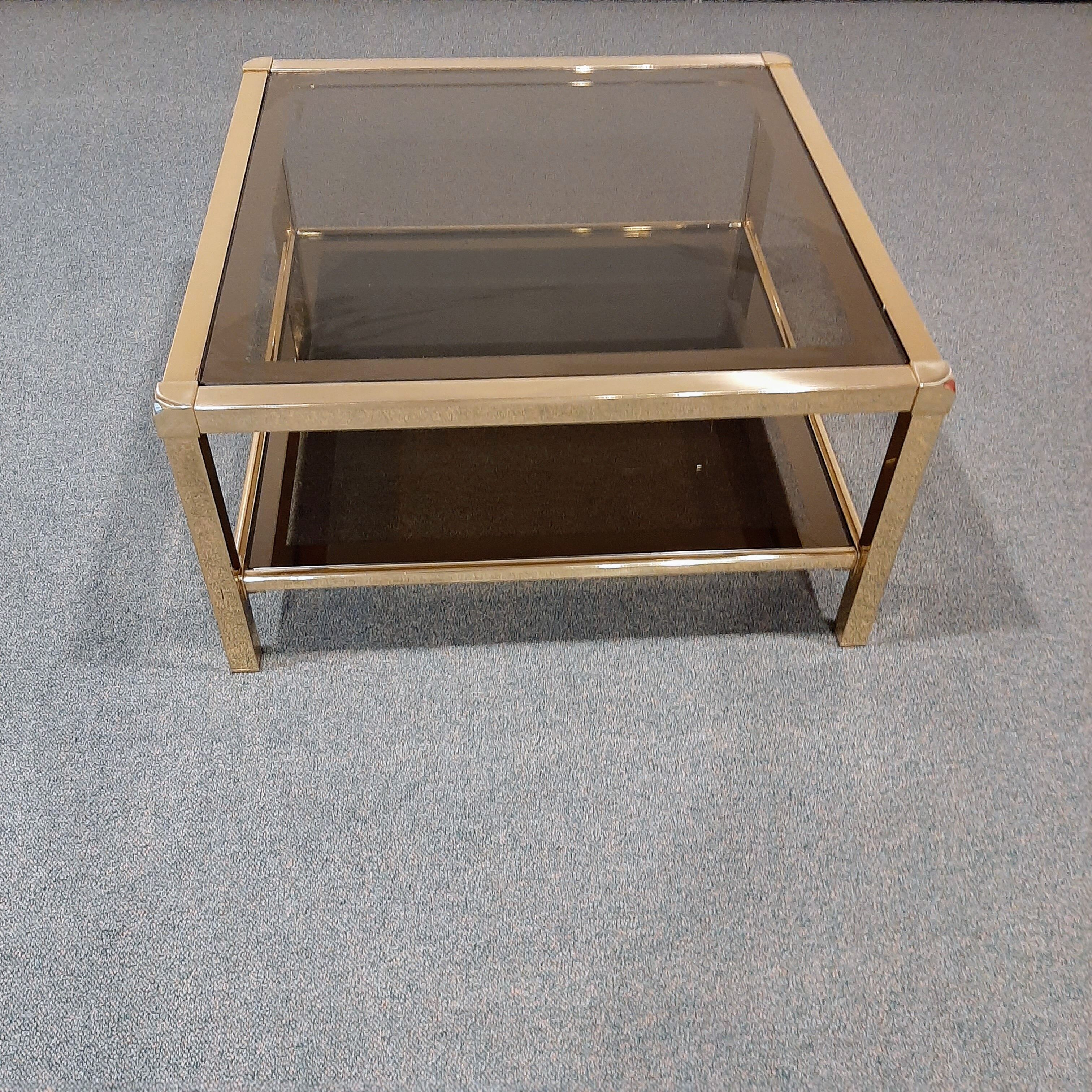 Vintage coffee table in smoked glass and brass 1970
