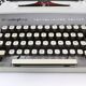 Remington travel-deter Deluxe typewriter with  case