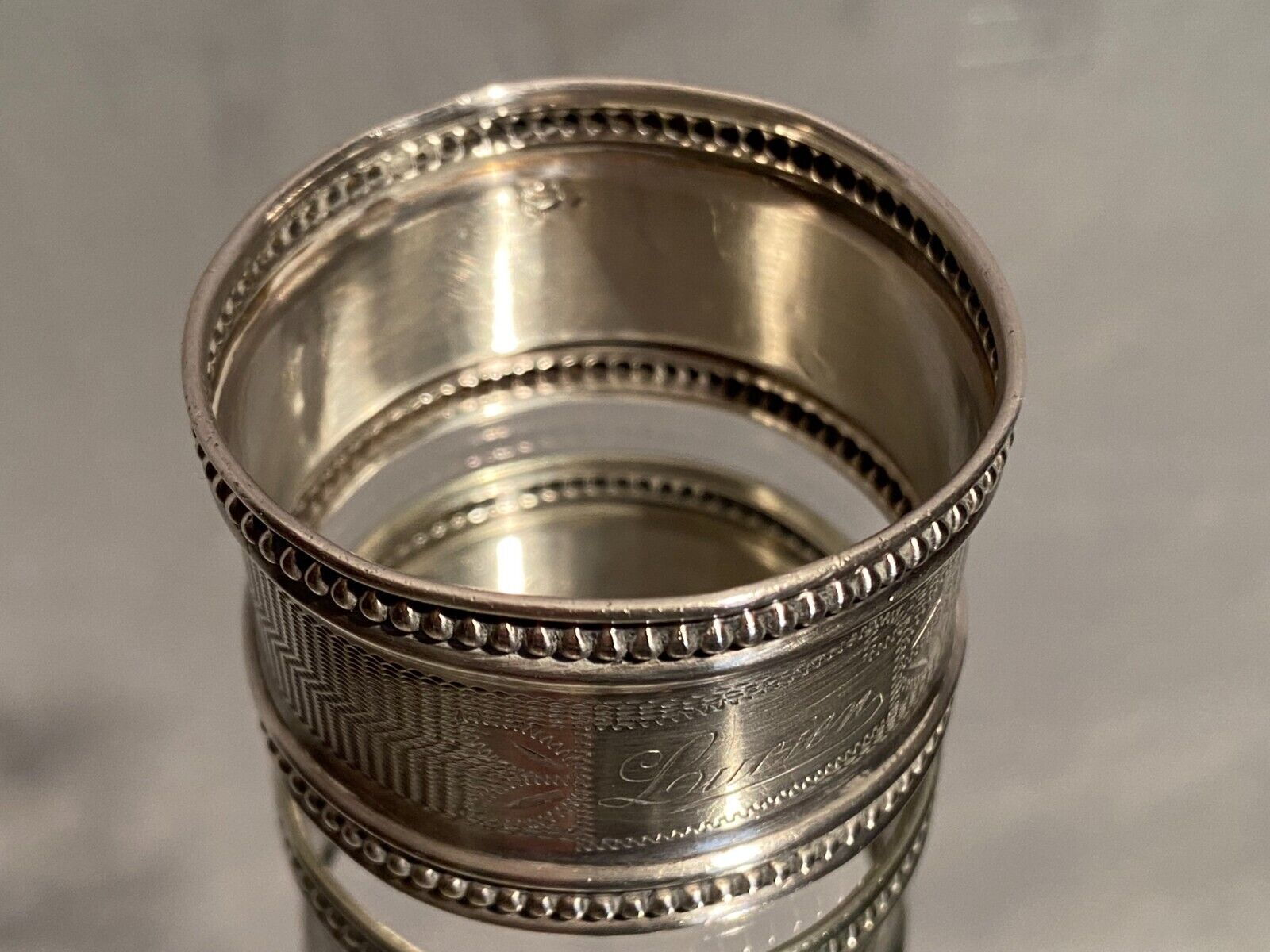 Solid silver napkin ring Minerva with Louis XVI style guilloché decoration
