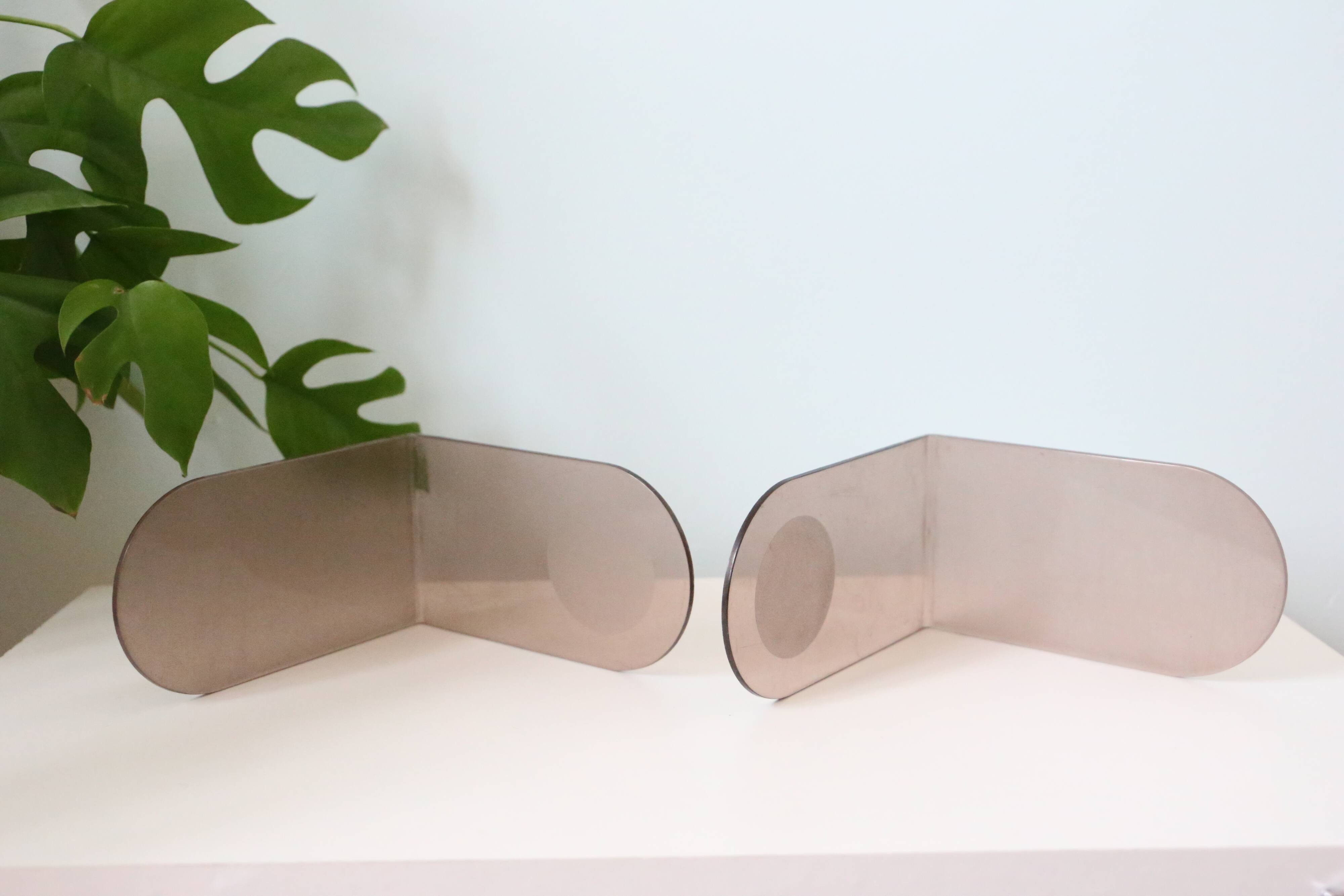 Pair of smoked plexiglass bookends, 1970s