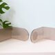 Pair of smoked plexiglass bookends, 1970s