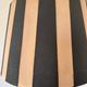 Vintage floor lamp in black patinated wood and striped lampshade