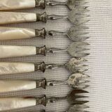 12 dessert forks in steel and mother-of-pearl