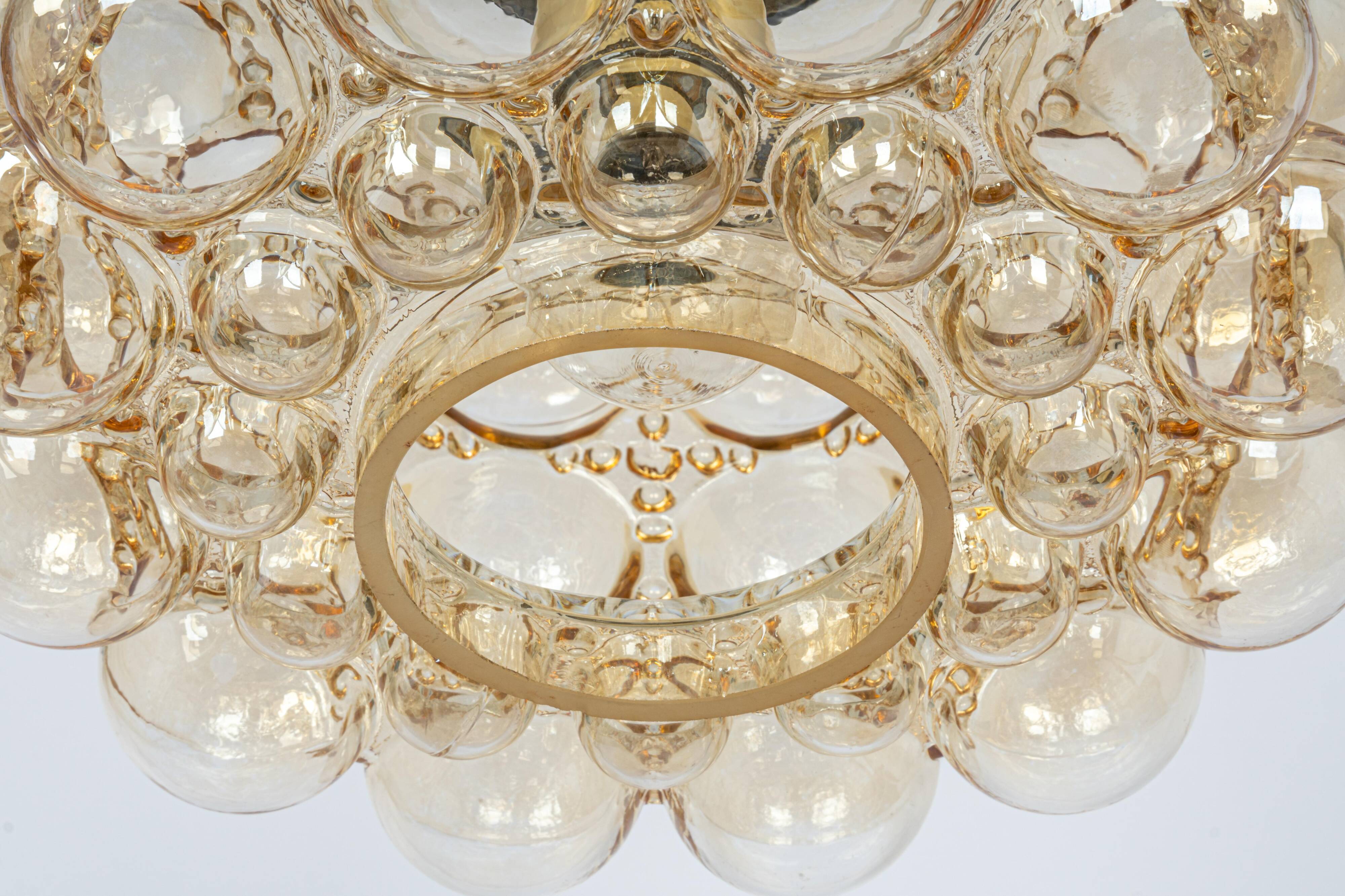 Large amber bubble glass pendant by Helena Tynell for Limburg, Germany, 1970s.