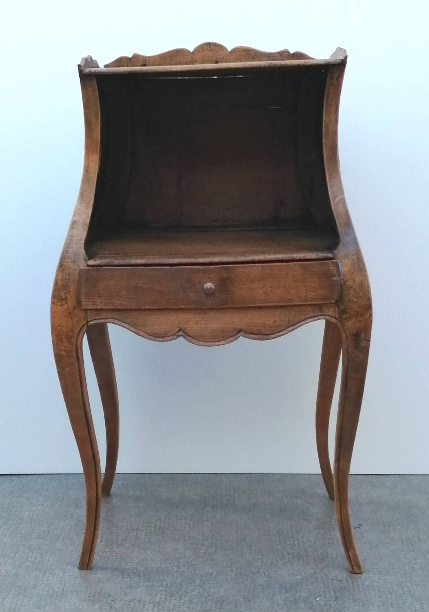 Belly bedside table with Louis XV style walnut mirror early 20th century 1920.