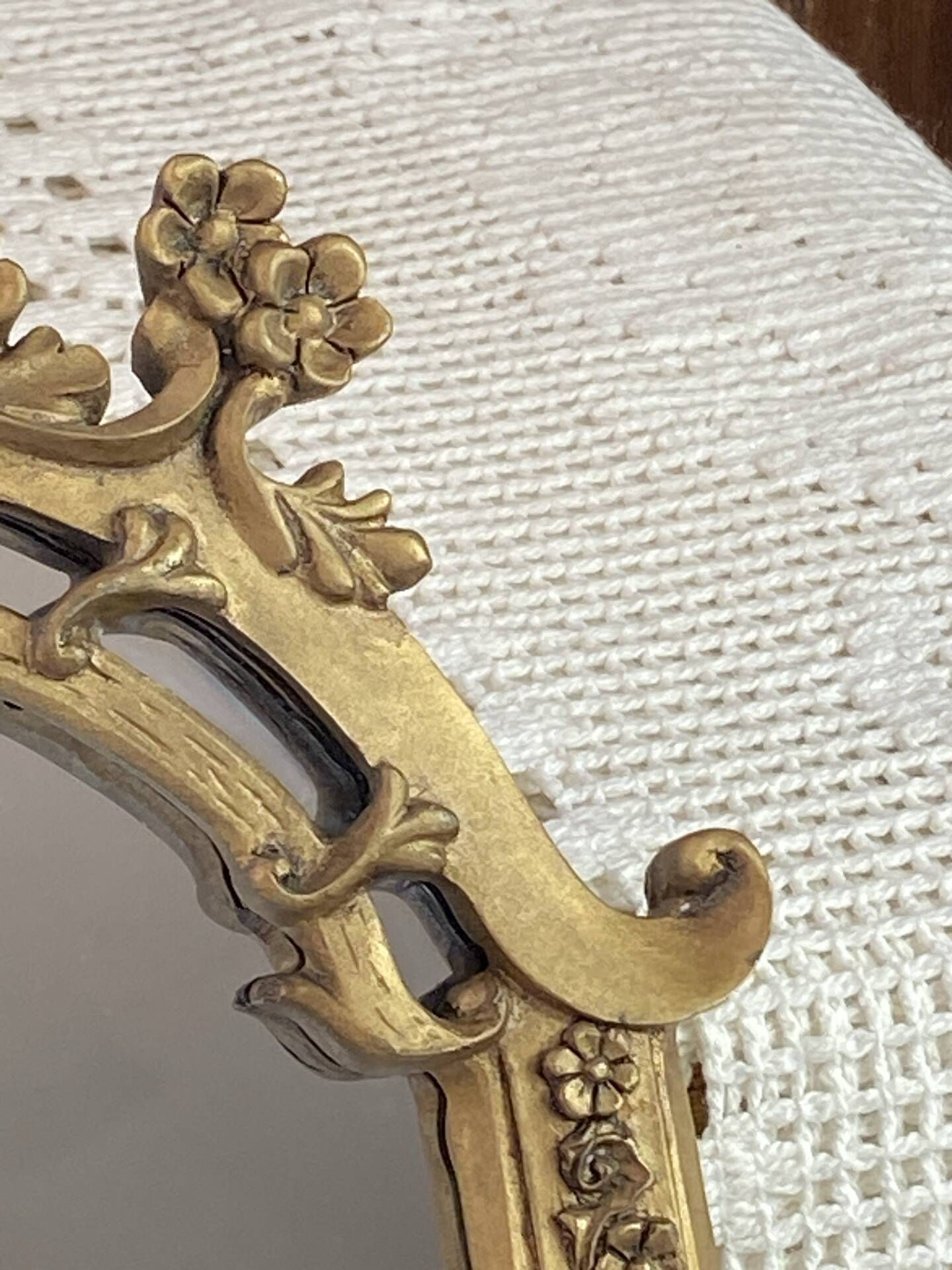 Baroque style mirror, decorated with shells and flowers.