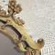 Baroque style mirror, decorated with shells and flowers.