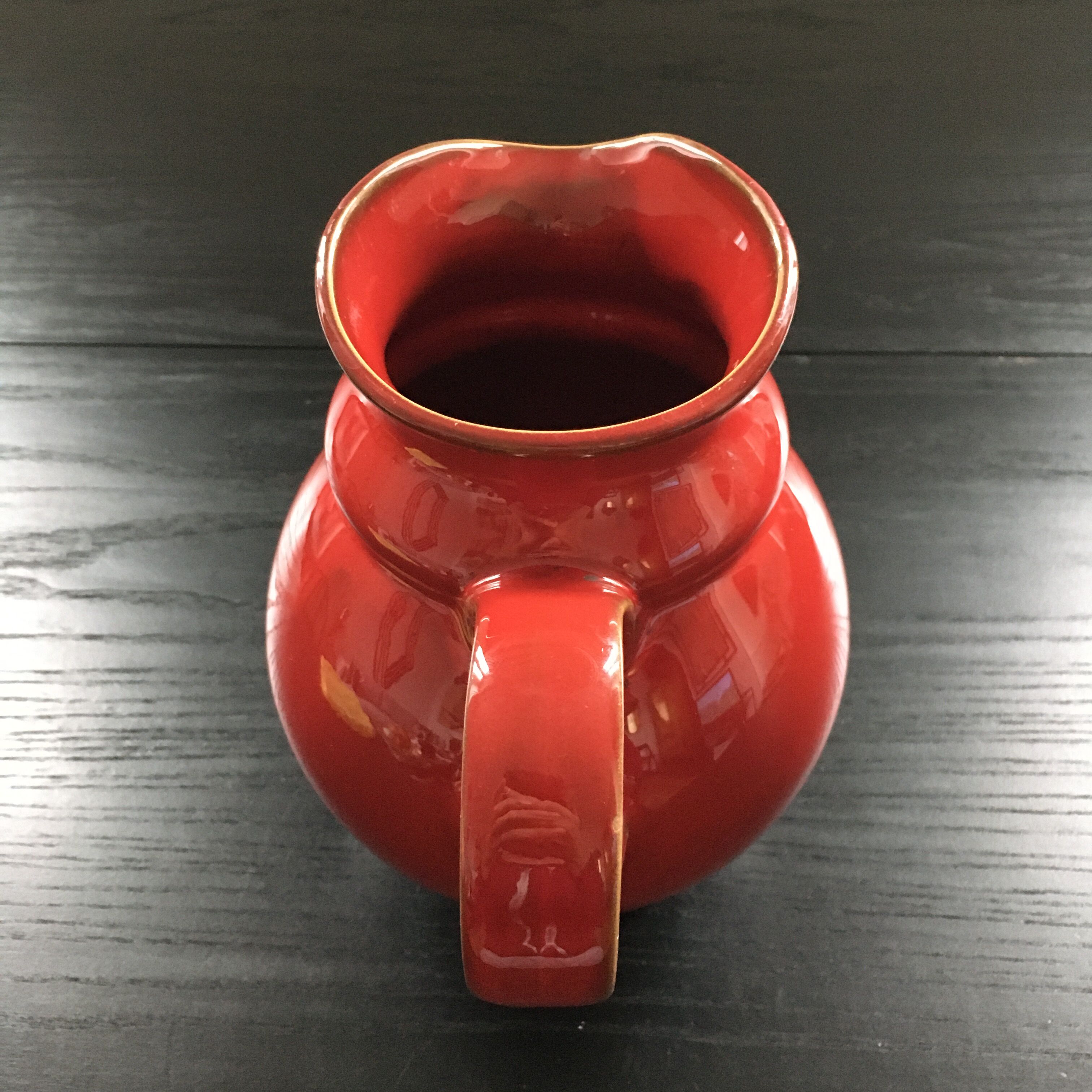 Dark red pitcher