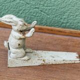 Old cast iron rabbit door wedge
