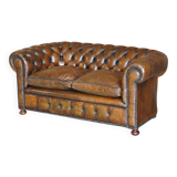 Restored leather Chesterfield sofa, walnut legs.