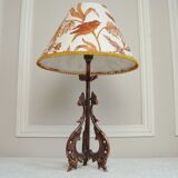 Rock-style table lamp with its vintage bird pattern shade