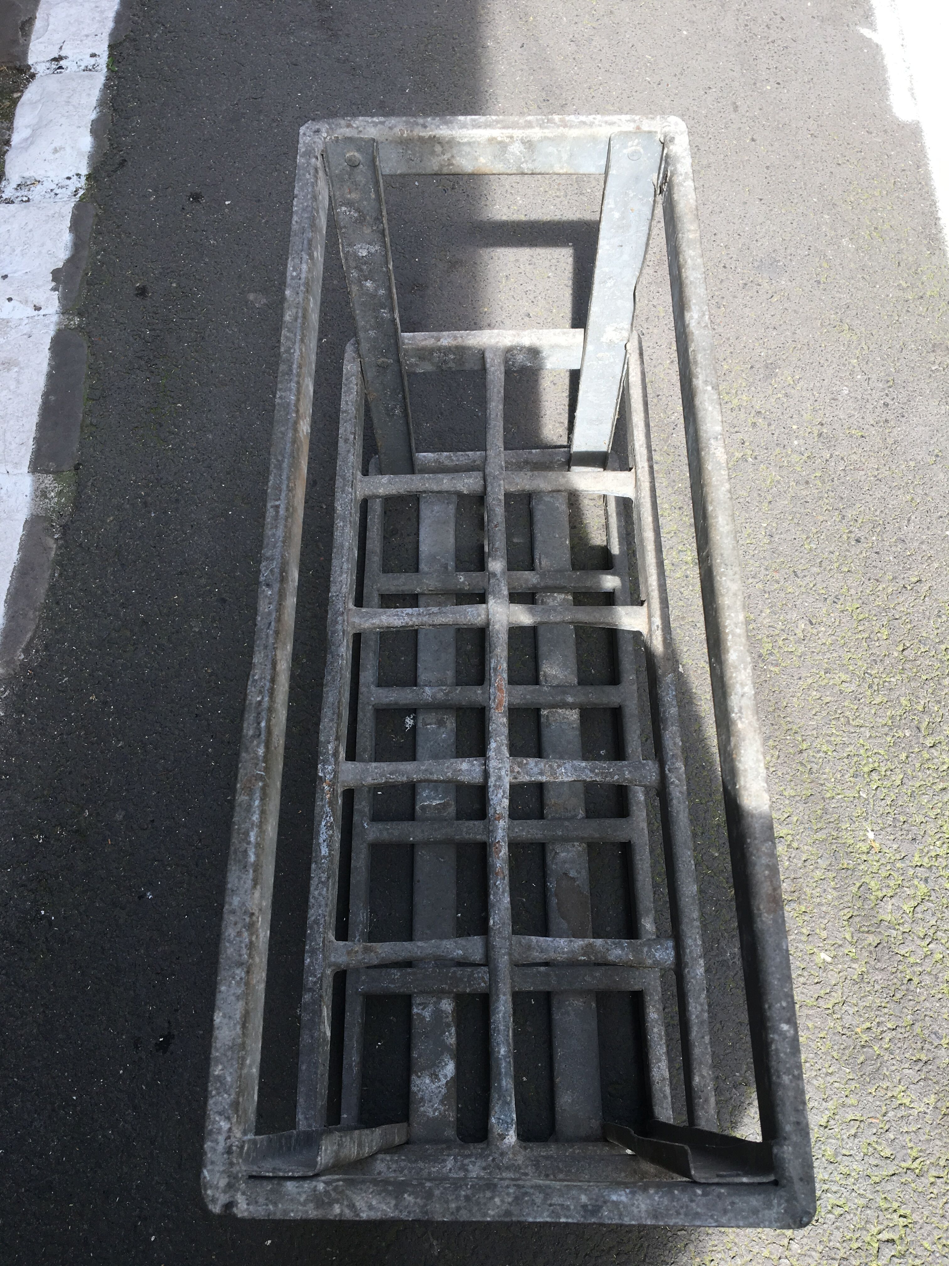 Old bottles in rectangular zinc locker