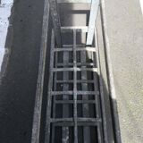 Old bottles in rectangular zinc locker