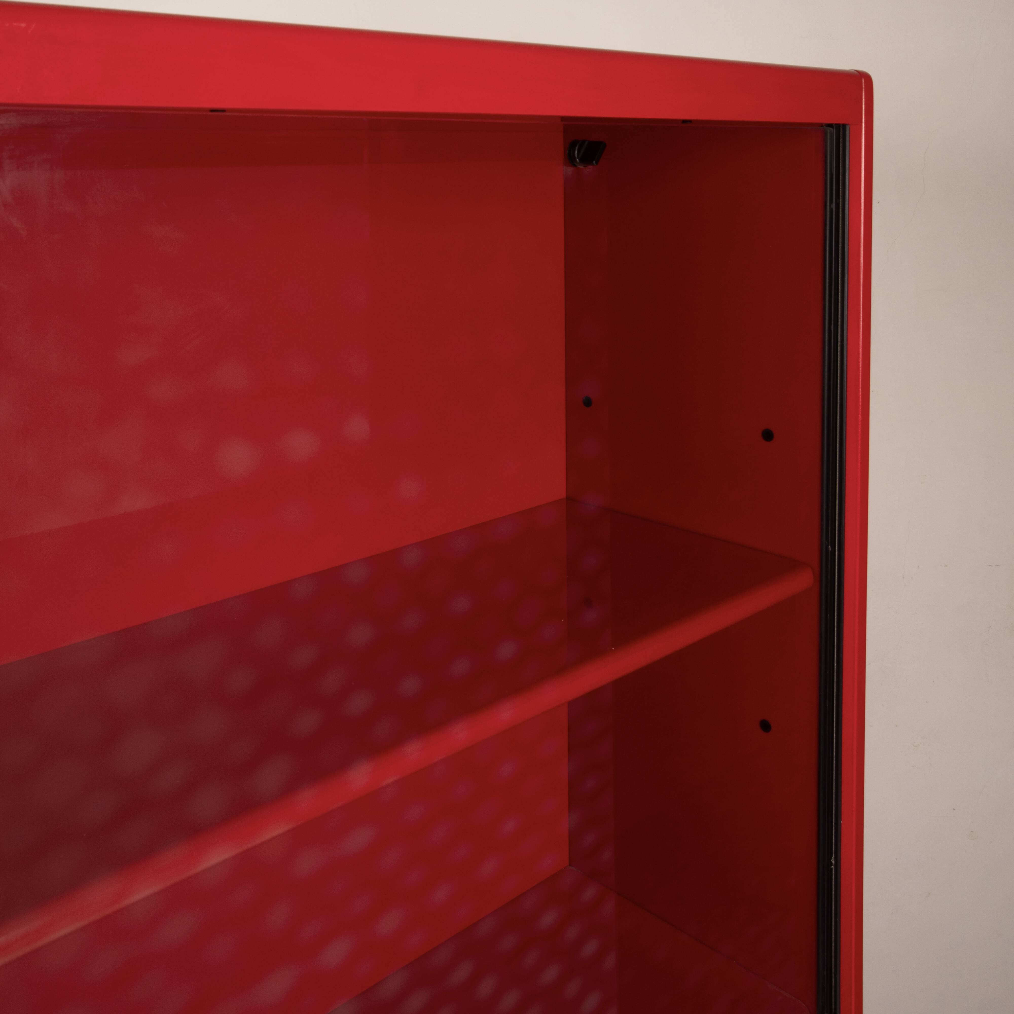 Double-face rotating display cabinet in red lacquer by Arflex, 1980s
