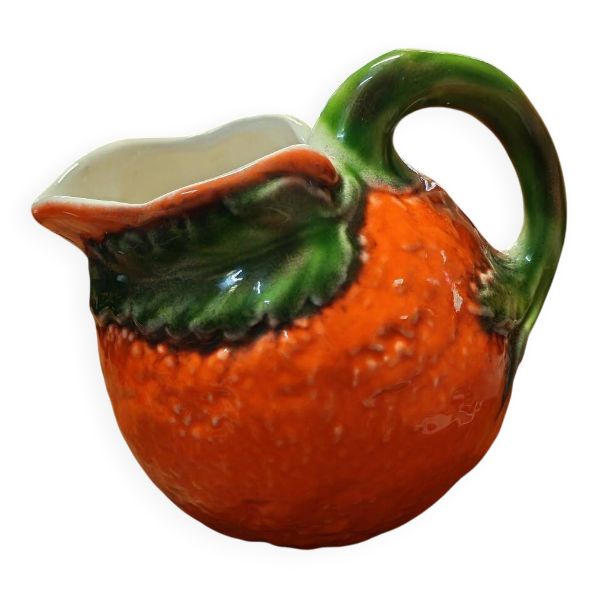 Orange slipware pitcher