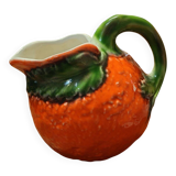 Orange slipware pitcher