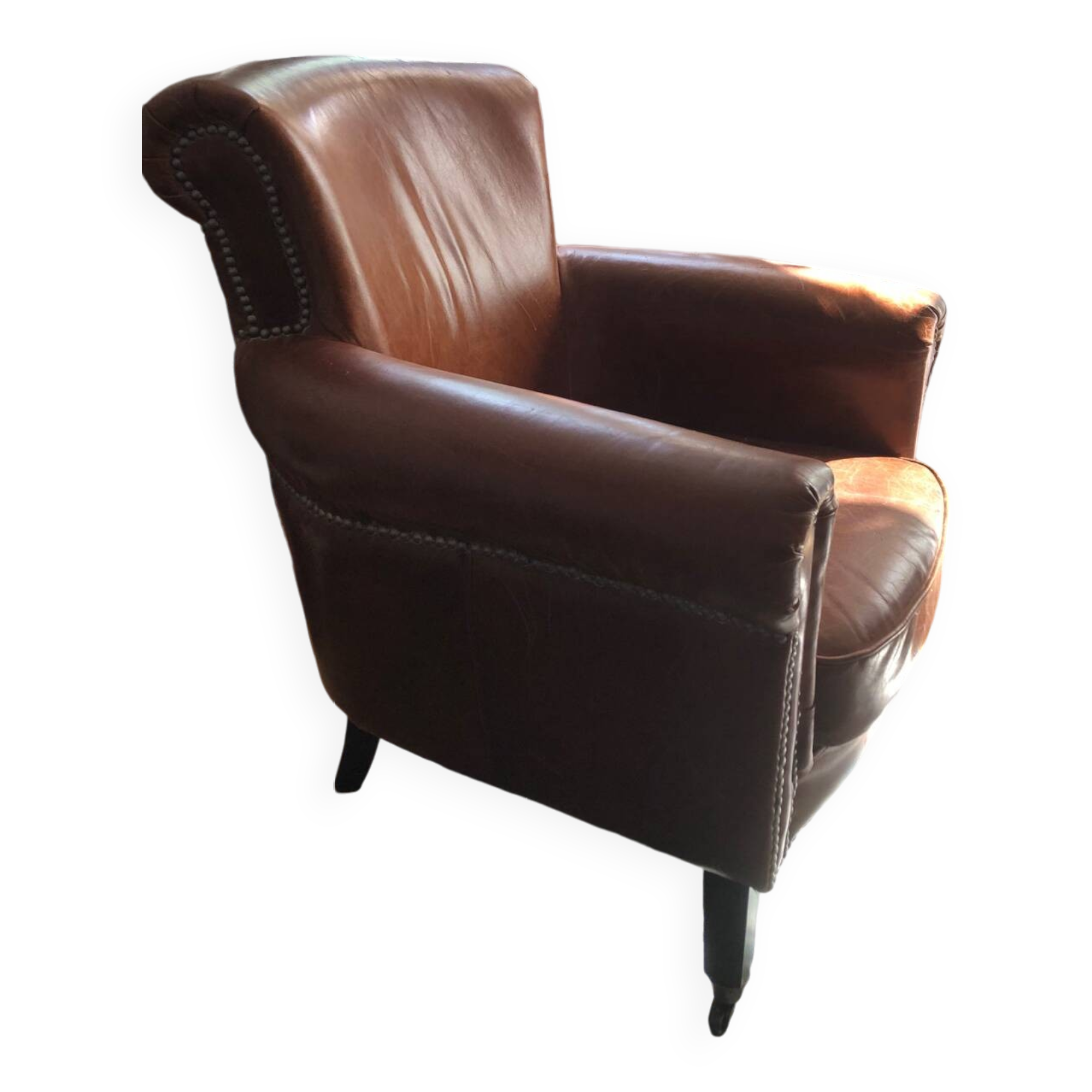 Industrial style aged leather armchair