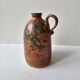 Ceramic handle soliflore vase with an unidentified signature