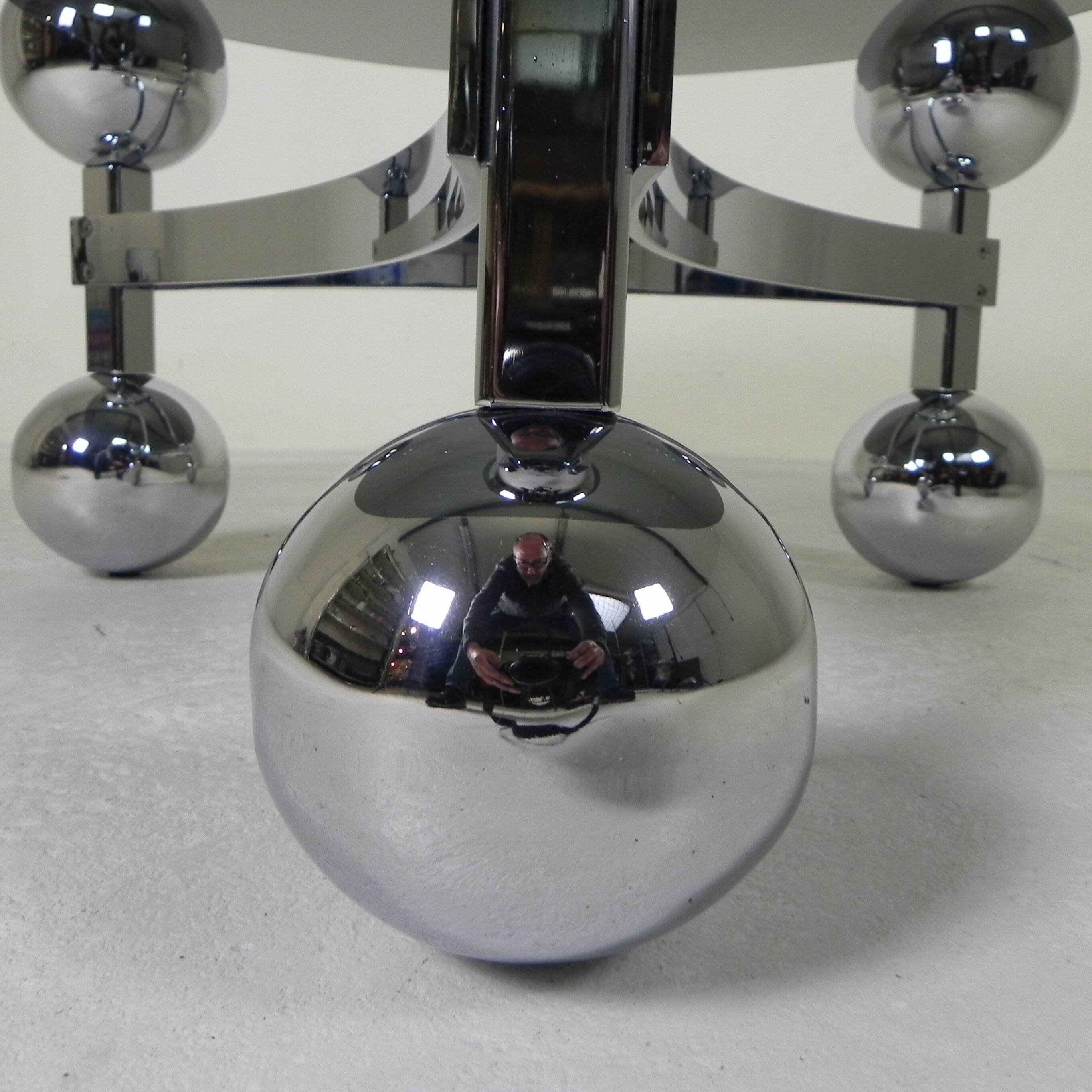Space Age Sputnik coffee table, with a 1970s chrome base