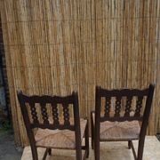 Pair of antique straw-seated farm chairs