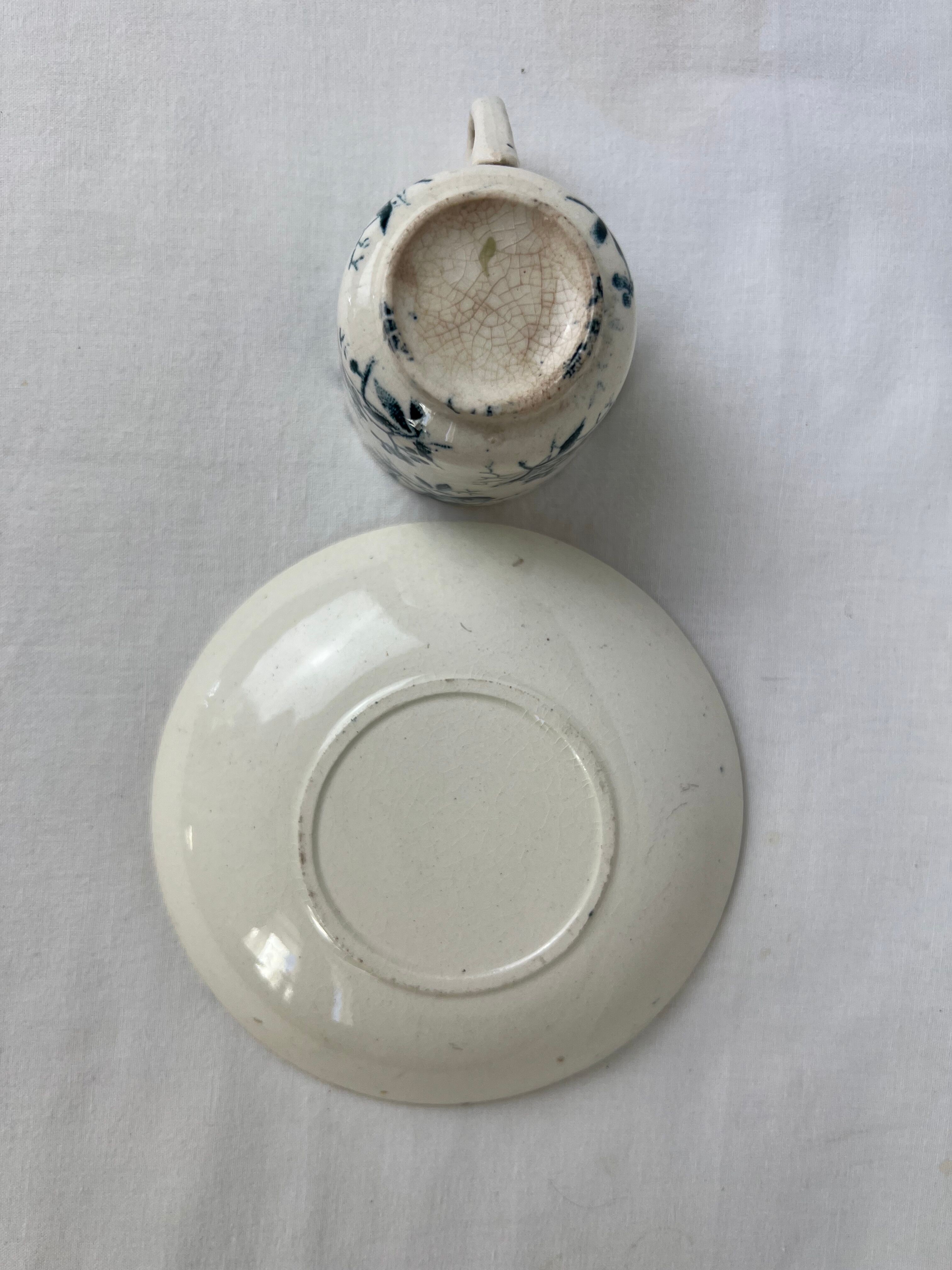 White porcelain cup with blue flowers