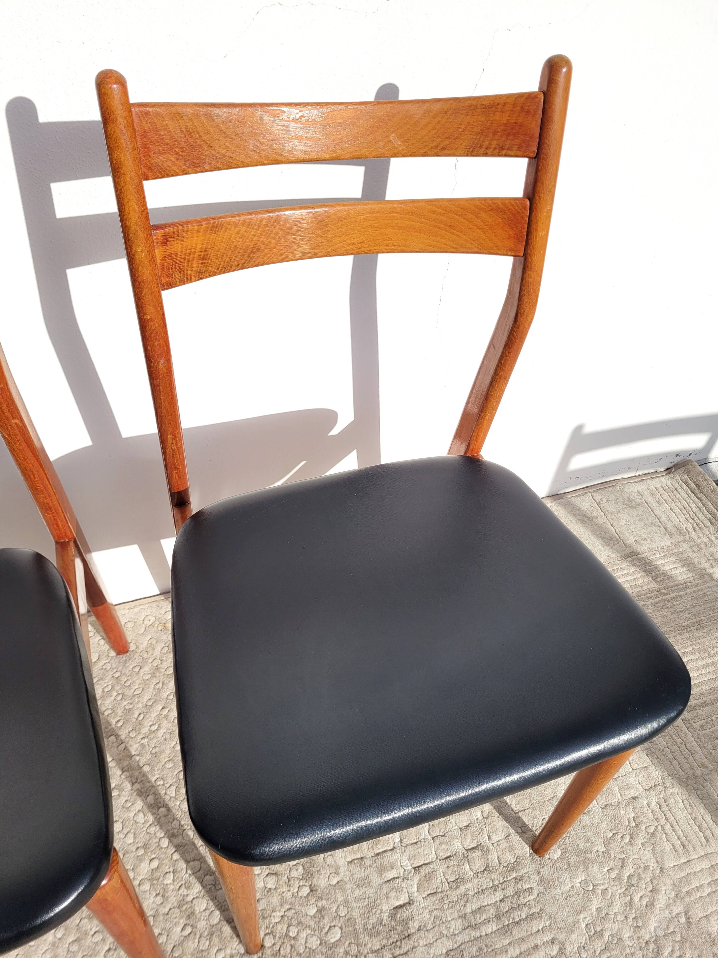 2 Scandinavian wooden chairs
