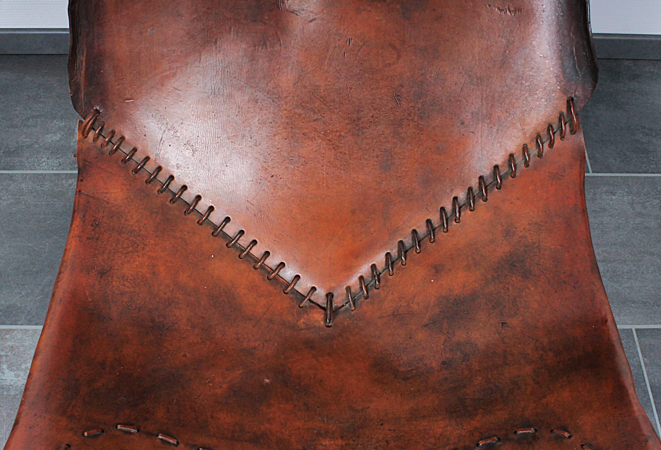 Brutalist oak lounge chair and ottoman, 1970s, set of 2