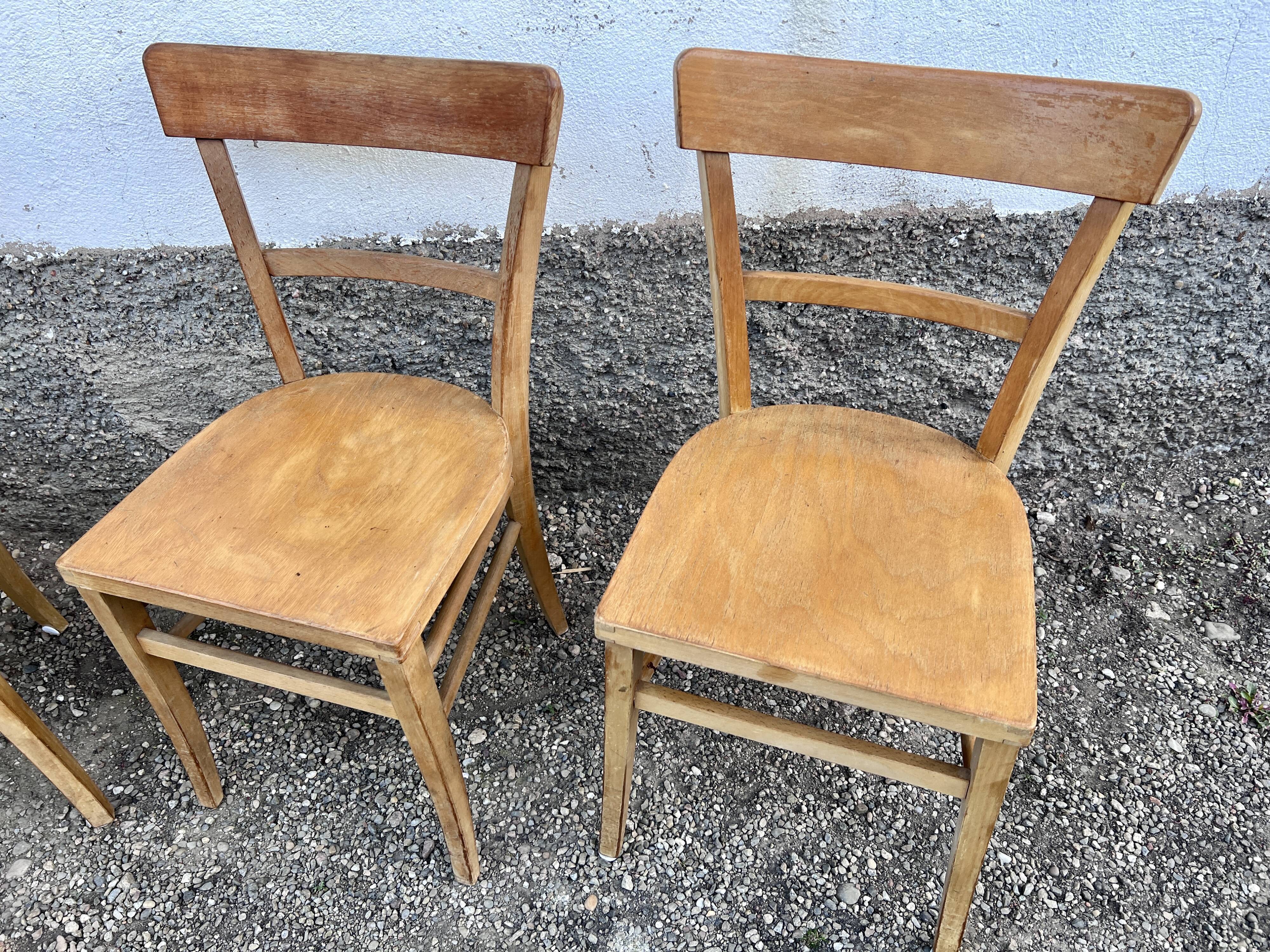 Series of 4 vintage wooden bistro chairs