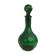 Carafe verte ancienne avec lignes nervurées