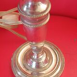 Old lamp base in silver metal.