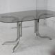 Chrome steel table with smoked glass top, France, circa 1970.