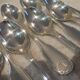 11 silver-plated dessert spoons by Christofle Vendome, 17cm