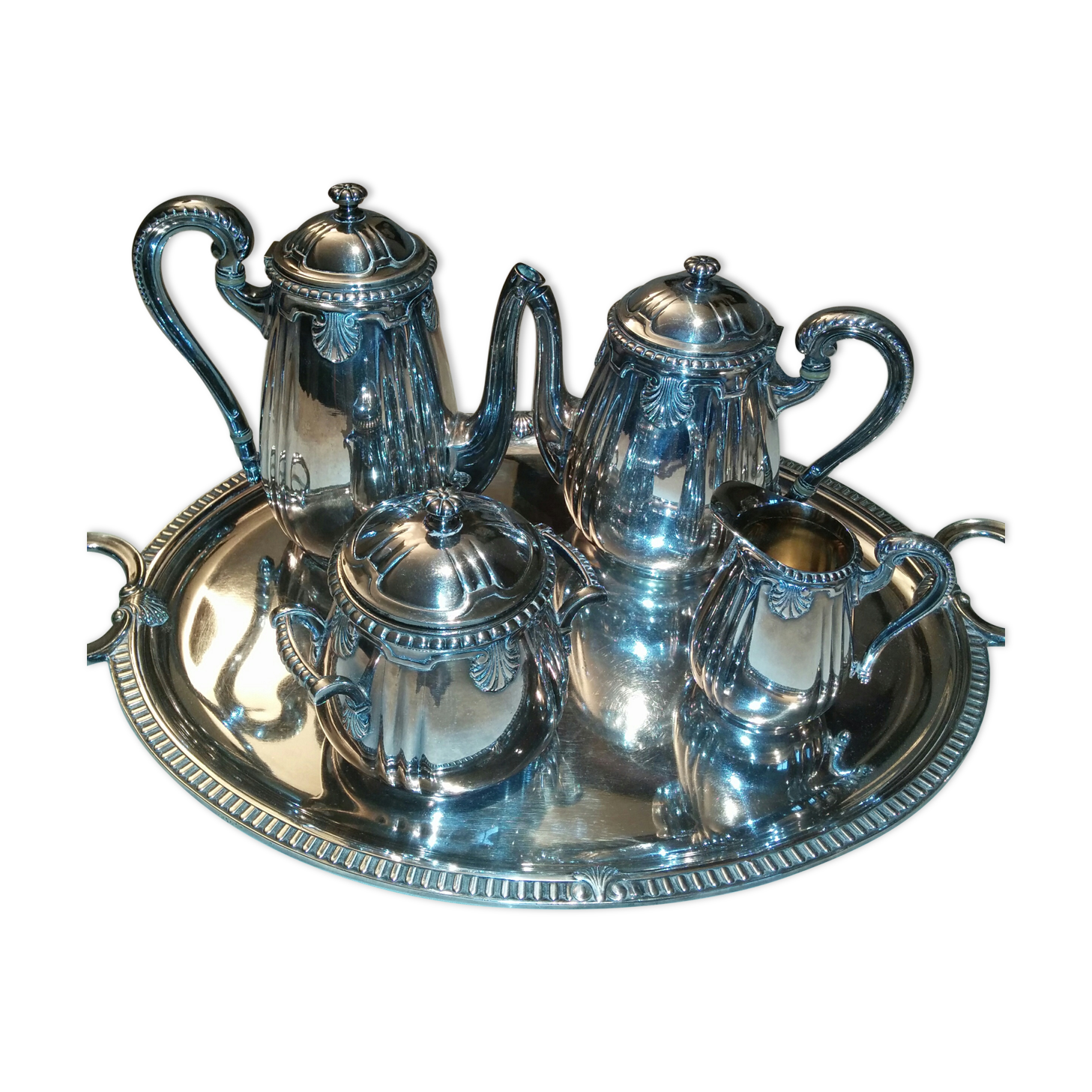 Silver metal coffee service with shell-shaped tray