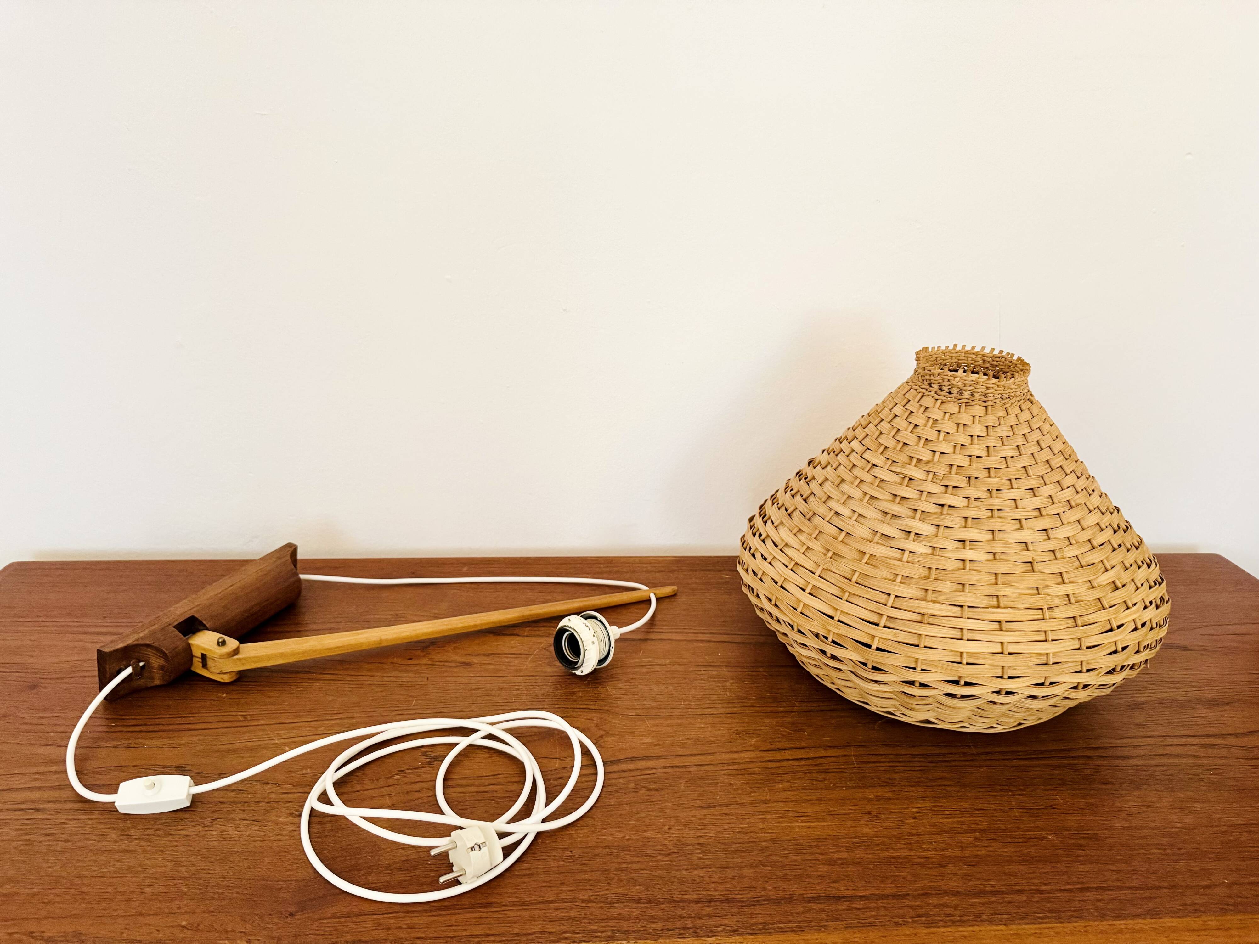 Adjustable Wicker Wall Lamp