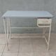 Industrial high table made of metal and formica.