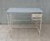 Industrial high table made of metal and formica.