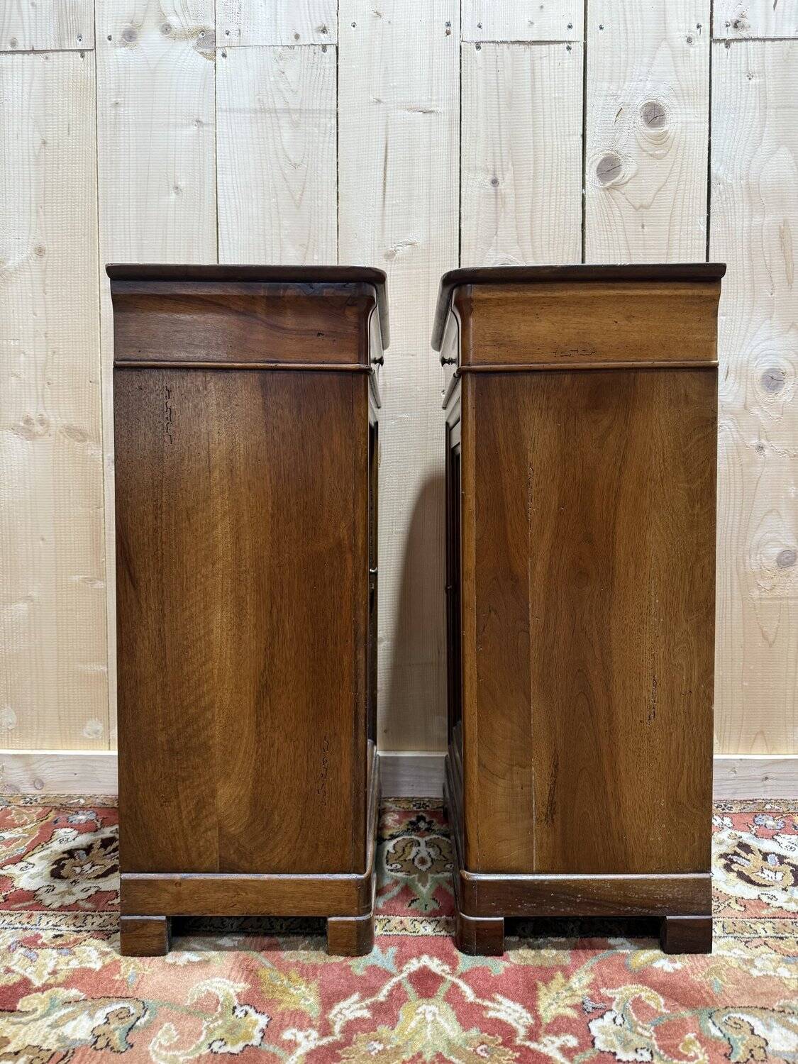 Pair of Louis Philippe style bedside tables in walnut